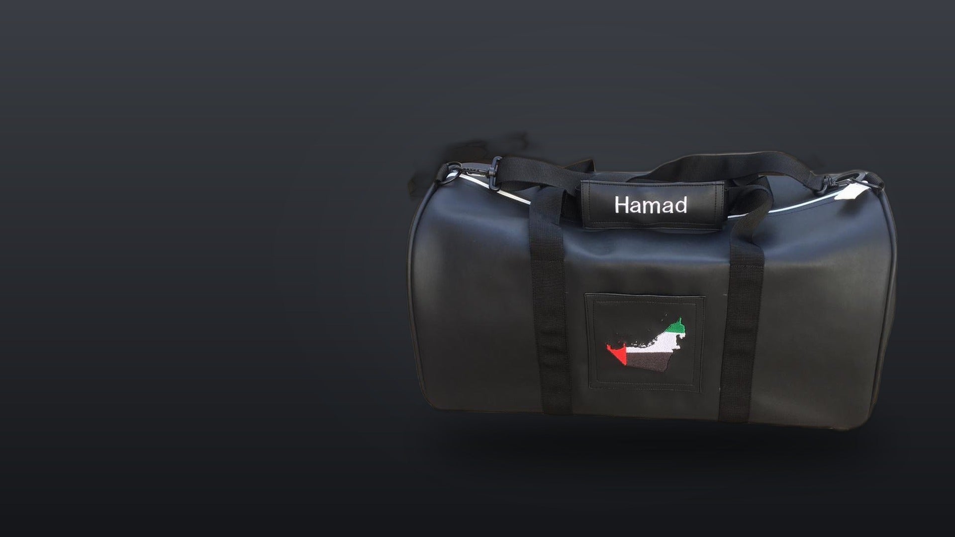 YOUNfit personalized black duffel bag with UAE flag embroidery